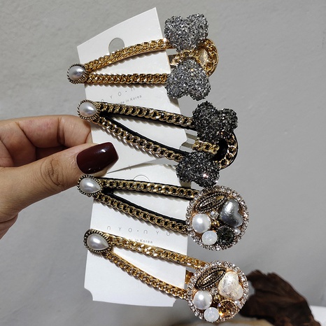 Fashion Water Droplets Bow Knot Alloy Plating Rhinestones Hair Clip's discount tags