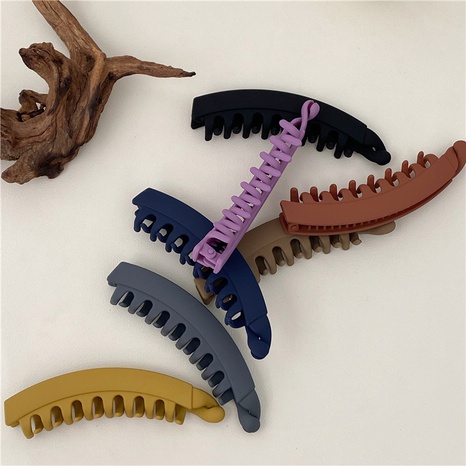 Simple Style Solid Color Plastic Hair Clip's discount tags