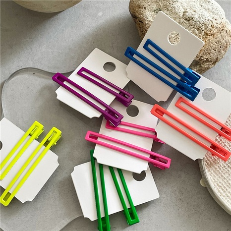 Simple Style Solid Color Alloy Hair Clip's discount tags