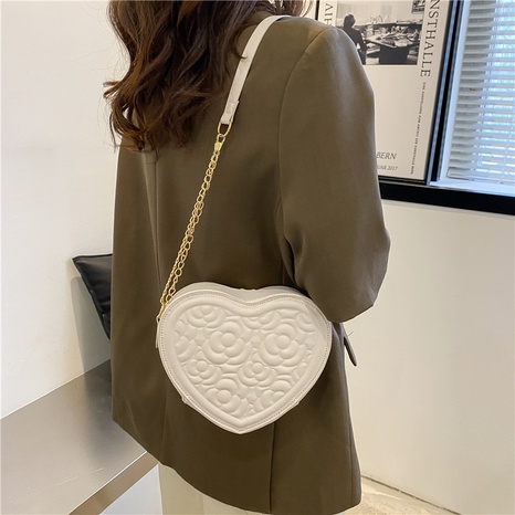 Streetwear Solid Color Heart-shaped Zipper Crossbody Bag's discount tags