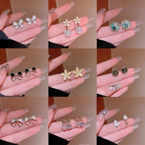 Fashion Flower Alloy Plating Inlay Artificial Gemstones Pearl Women'S Ear Studs 1 Pair's discount tags