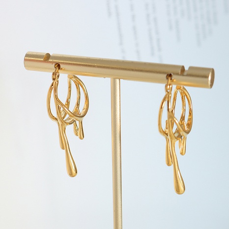 Fashion Irregular Water Droplets Copper Gold Plated Hollow Out Drop Earrings 1 Pair's discount tags