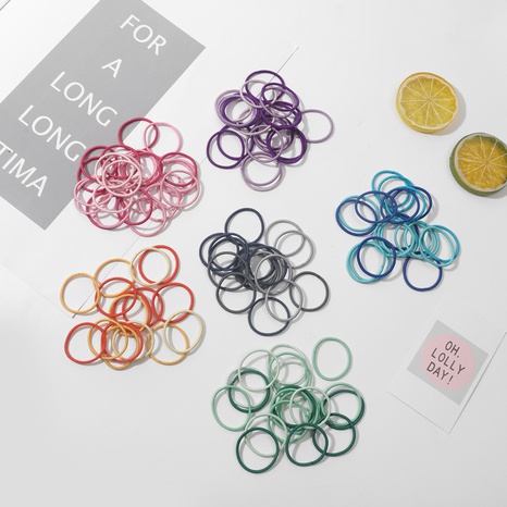Simple Style Colorful Hair Tie 100 Pieces's discount tags