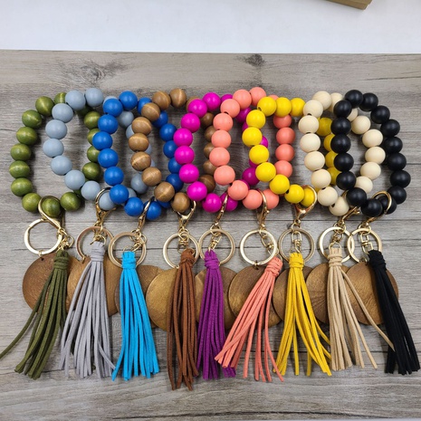 Retro Geometric Solid Color Wood Beaded Tassel Bracelets's discount tags